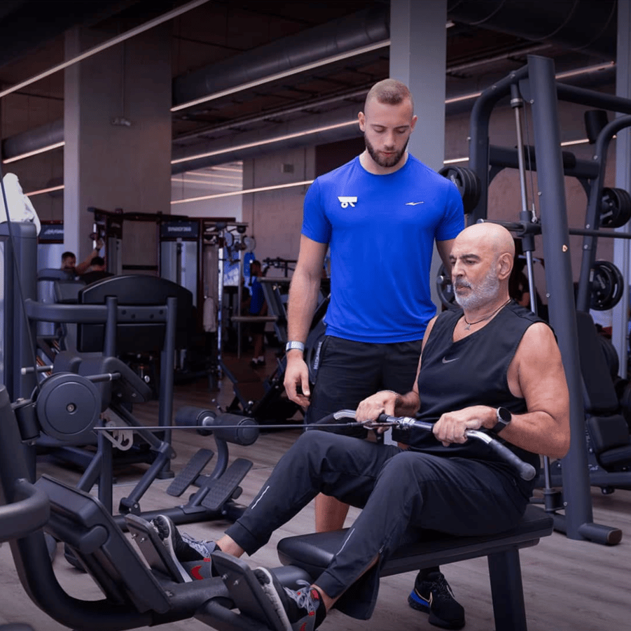 man working out on rowing machine