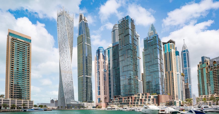 photo of dubai marina with multiple skyscrapers in the background